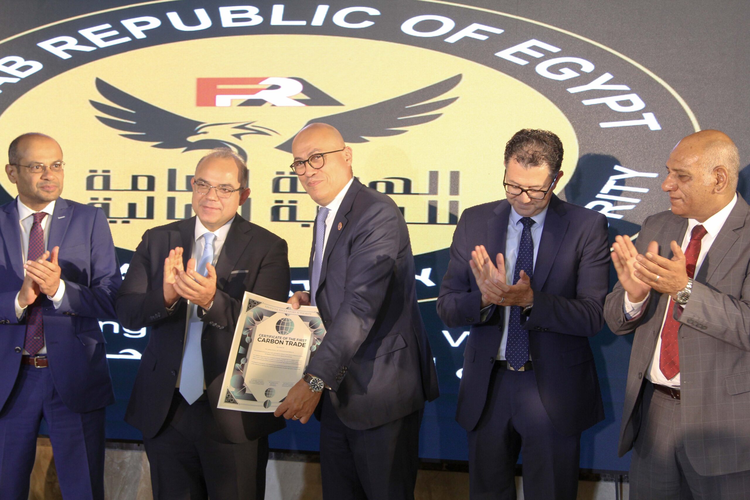 Officials of the two companies, the stock exchange and the Financial Regulatory Authority during the signing of the carbon credits deal agreement